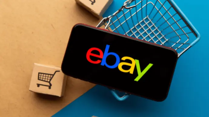 ebay logo on black smartphone screen